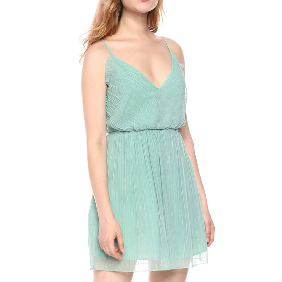 BCBGeneration Dresses & Skirts - BCBGeneration Sleeveless Pleated Cocktail Dress